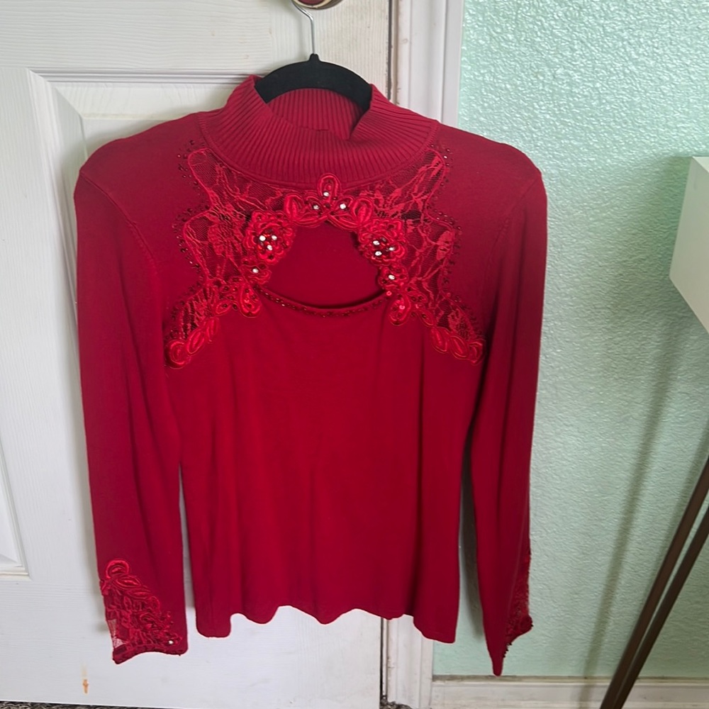 Selling red Christmas sweater with lace and Jewels. Fits like a Small.